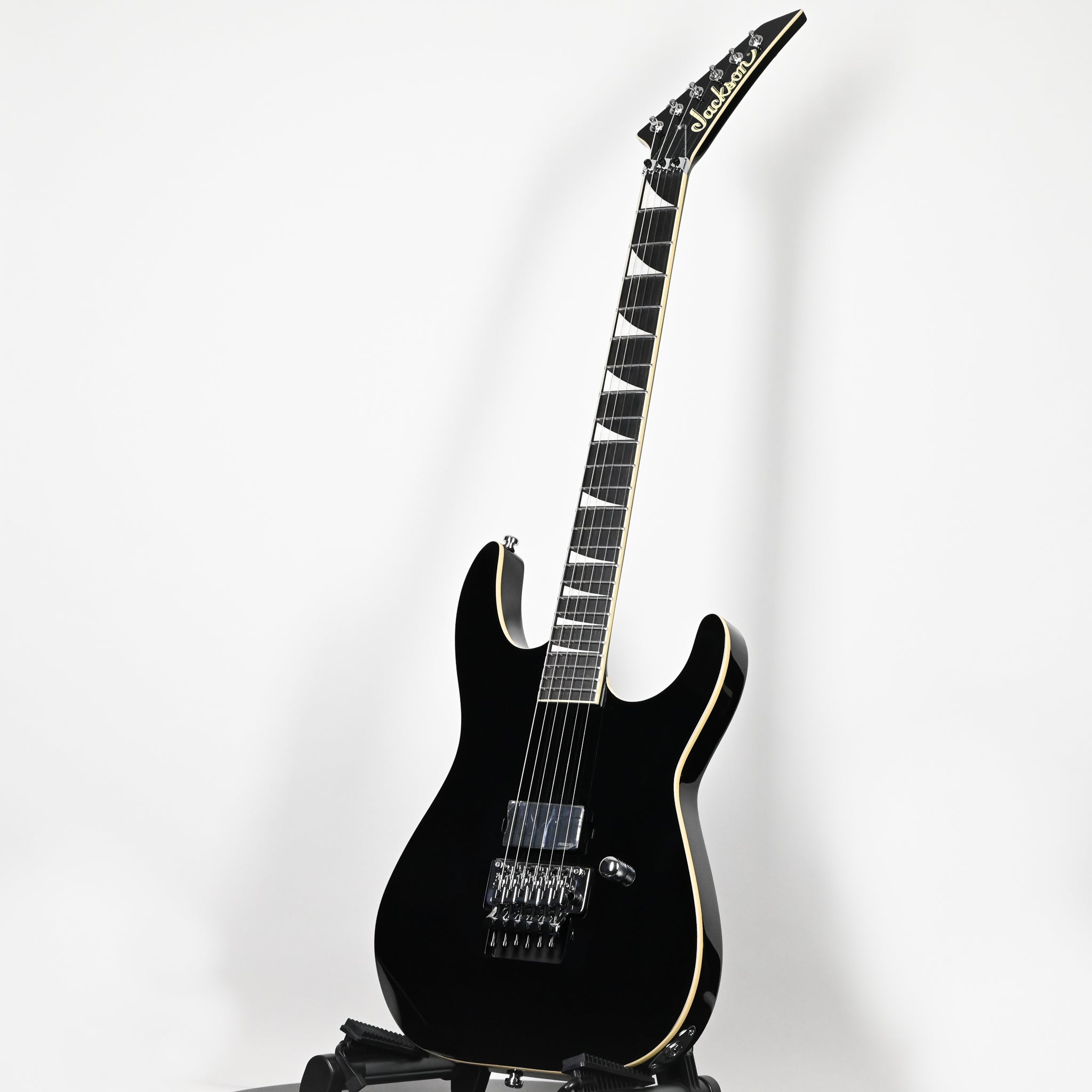 Jackson Pro Plus Series SL1A Soloist Limited Edition Electric Guitar- Gloss Black w/ Aged White Binding (ICJ2502932)